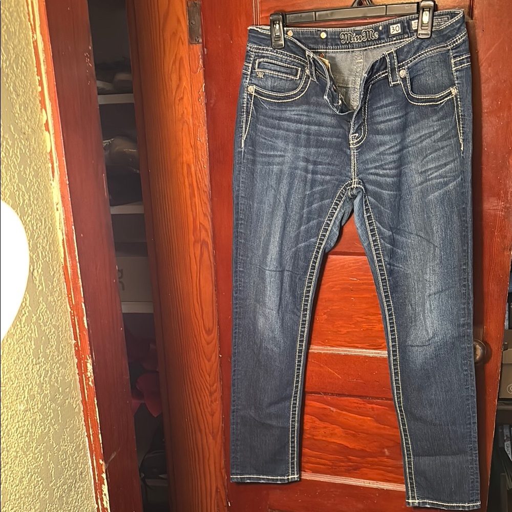 Women’s Miss Me Jeans.
